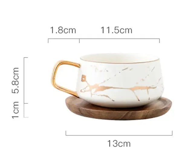 Marmormuster Kaffeetasse mit Goldverzierung