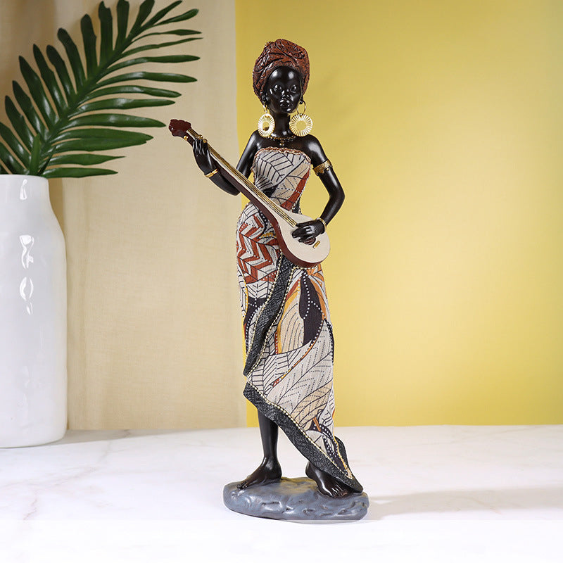 Afrikanische weibliche Musiker-Skulptur