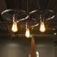 Frendorf | Rustiron Kronleuchter | Industrielles Design mit Eisenrädern | 1/3/6-flammig | Loft- und Wohnraum-Beleuchtung