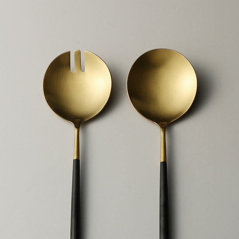 Schwarze und goldene Salatbesteck- und Servierutensilien-Set