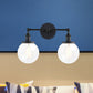 Frendorf | Runde Wohnzimmer Wandleuchte Industriell Klarglas 2-Lampe Schwarz/Messing Wandlampe für das Arbeitszimmer