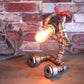 Schmiedeeisen Roboter Tischleuchte mit Wasserhahn Steampunk 1 Glühbirne Café Tischlampe in Silber
