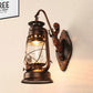 Frendorf | One Bulb Wandlamp met Lantaarn Schaduw Helder Glas Kust Slaapkamer Wandlamp in Zwart/Antiek Messing/Verweerd Koper met Zeemeermin