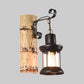 Frendorf | Eine Wandleuchte mit einer Laterne aus klarem Glas im industriellen Stil, Wandlampe für das Esszimmer in Schwarz mit einer Rückplatte aus Bambus