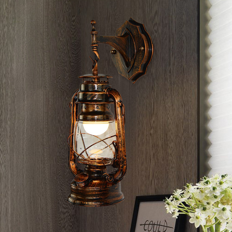 Frendorf | Eine Wandlampe mit einem Laternen-Schirm aus klarem Glas Küsten Badezimmer Wandleuchte in Antik Kupfer