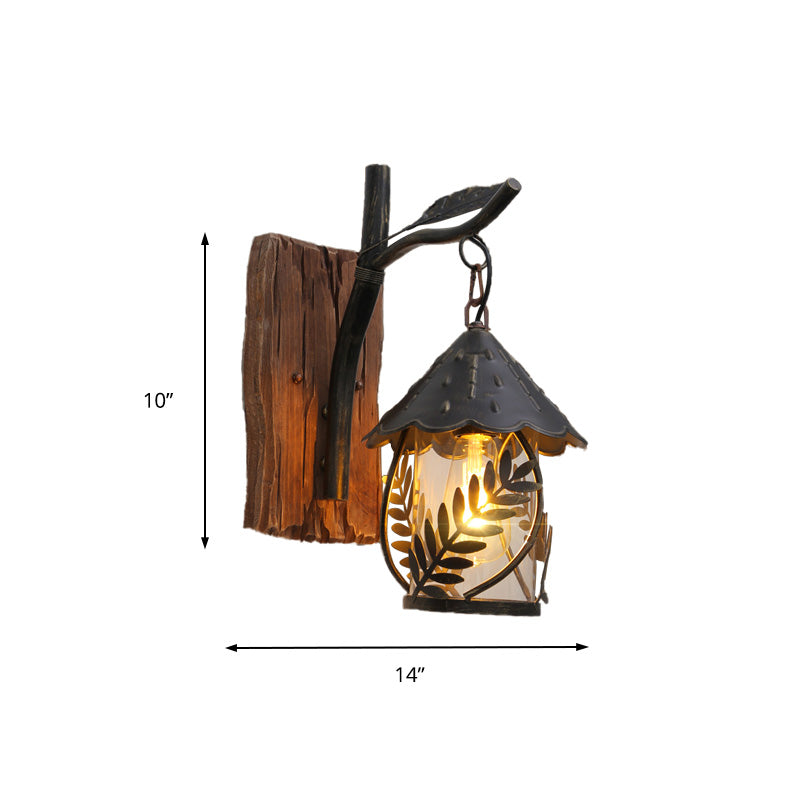 Frendorf | Eine Wandleuchte mit einem Glaskolben und zylindrischem Schirm aus klarem Glas, industrielle Wandlampe für das Wohnzimmer mit Blattzweig in Schwarz