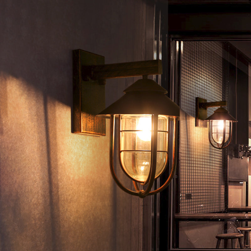 Frendorf | Laterne-förmige Balkon-Wandlampe Lager Metall 1 Kopf Wettergegerbtes Kupfer/schwarz Wandbeleuchtungseinheit mit ovalem klarem Glasschirm