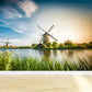 Vollformatfotografie Moderne Wandtapete mit Windmühle und Grasland in Grün