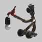 Metallic Sitzender Roboter Tischleuchte mit Wasserhahn Deco Steampunk 1 Licht Kinderzimmer Tischleuchte in Bronze/Silber