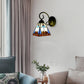 Frendorf | 1 Kopfstück-Wandlicht Leuchte Tiffany-Blau Buntglas Wandskulptur Licht mit geschwungenem Arm