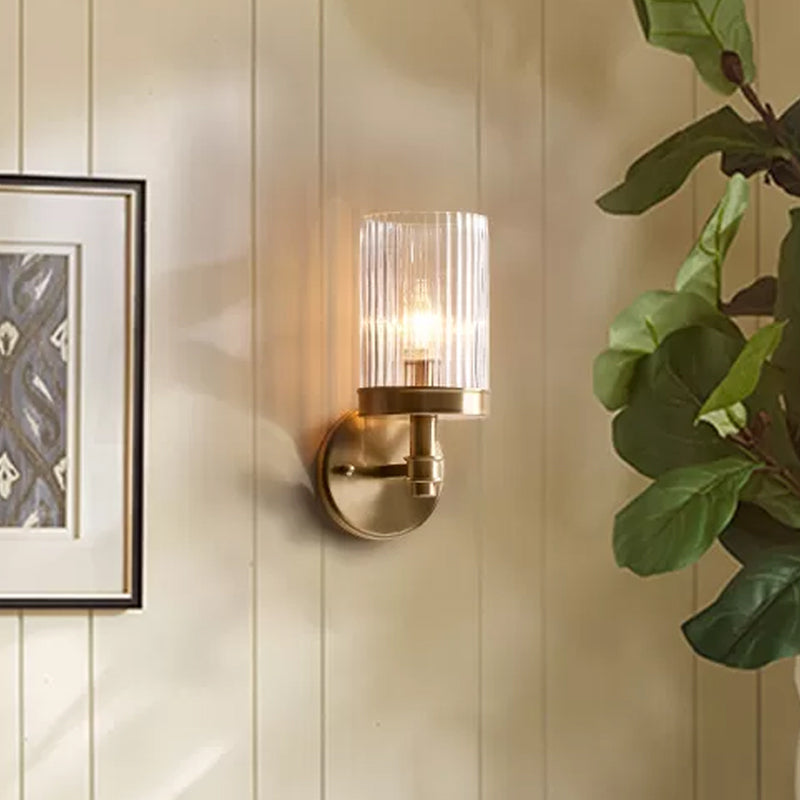 Frendorf | 1-Licht Wandmontage Lamp Traditionele Zylinder Transparante Glas Wandleuchte in Braun/Gold über dem Bett