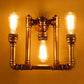 Frendorf | Industrielle Exposed Wandlampe mit Rohrdesign 3 Köpfe Schmiedeeisen Wandleuchte in antikem Messing für Flur