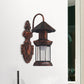 Frendorf | Einschaliger Wandleuchte mit Kerosinschirm klar Glas Küsten Außenleuchte in Schwarz/Kupfer/Bronze
