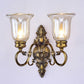 Frendorf | 1/2-Licht Klar Glas Wandlicht Traditionelle Bronze Glockenschirm Esszimmer Wandlampe mit geschwungenem Arm