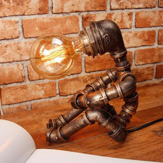 Sitzender Roboter Eisen Nachttischlampe Retro-Stil Einzelzimmer Tischlicht in Bronze