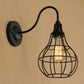 Frendorf | Industrielle Globe/Träne Käfig Wand Sconce Metall 1 Glühbirne Metallische Wandbeleuchtung mit Schwanenhalsarm in Schwarz
