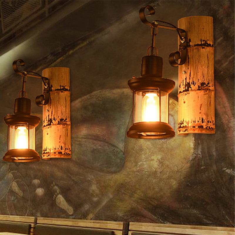 Frendorf | Eine Wandleuchte mit einer Laterne aus klarem Glas im industriellen Stil, Wandlampe für das Esszimmer in Schwarz mit einer Rückplatte aus Bambus