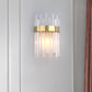 Frendorf | 2 Köpfe Schlafzimmer Wandlicht Postmodern Schwarz/Gold Wandlampe mit Halbzylinder Drei Seiten Kristallstangen-Schirm