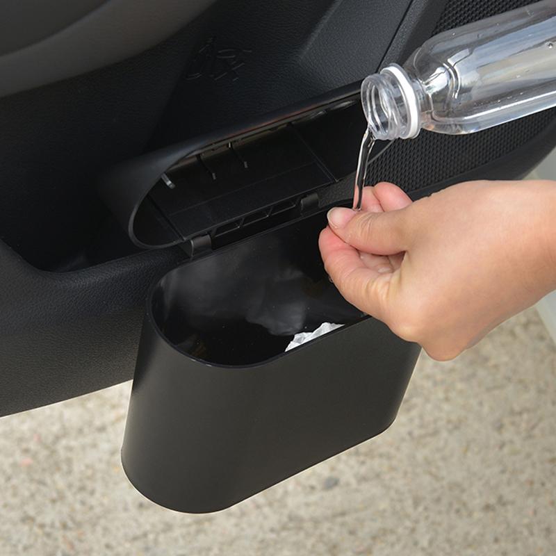 Frendorf | Autotür hängender Mülleimer