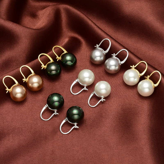 Frendorf | Black pearl earrings Available in white champagne gray gold and black pearl dangling earrings