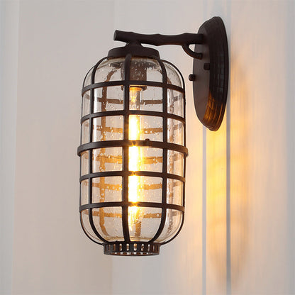 Frendorf | Gecageerde Zaden Glas Wandgemonteerde Lamp Industriële Enkele Gloeilamp Buitensculptuur Licht in Zwart/Bronze, 5.5"/6"/8" Breed