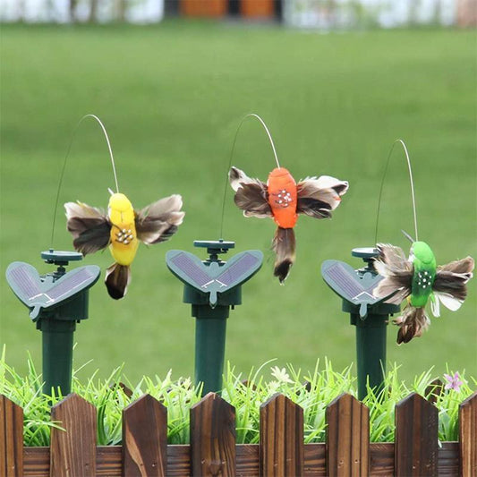 Solarbetriebener tanzender Kolibri und Schmetterling