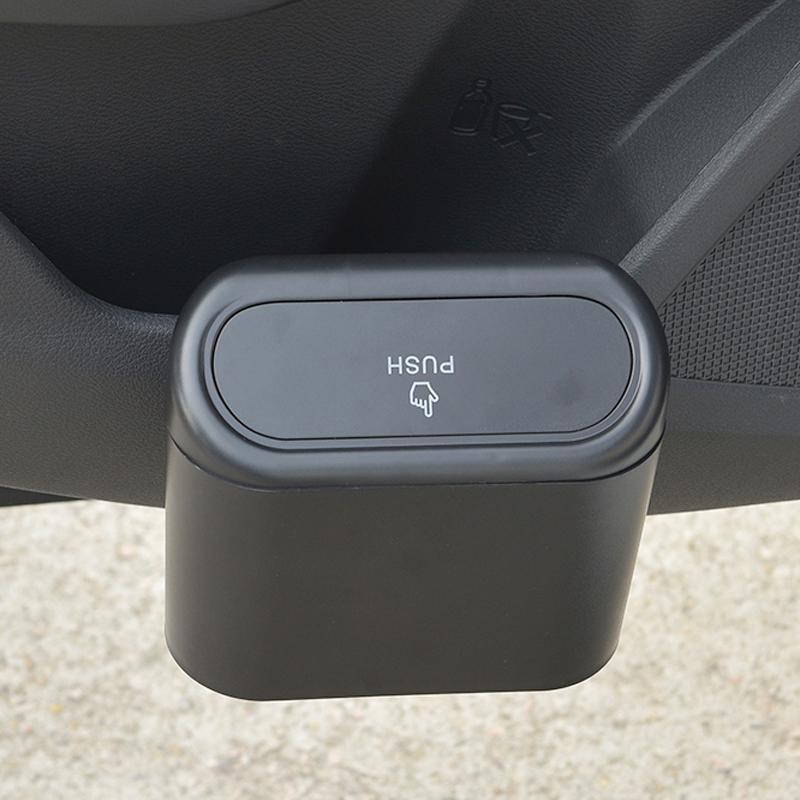 Frendorf | Autotür hängender Müllbehälter