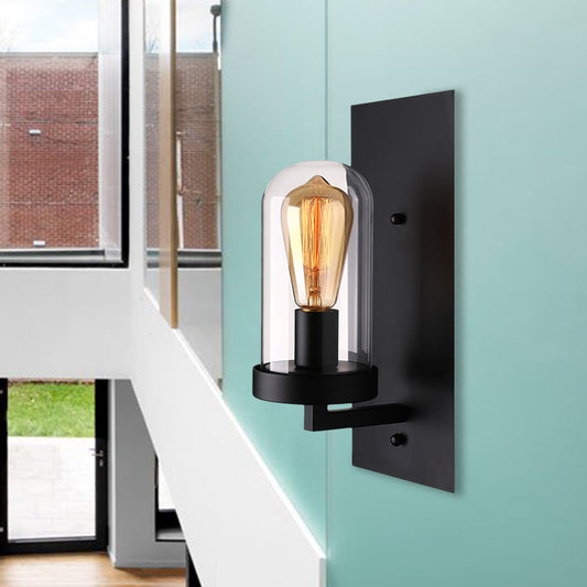 Frendorf | Eine Wandleuchte mit einer Pillenkapsel-Schirm aus klarem Glas, industrielle Wohnzimmer-Wandbeleuchtung in Schwarz