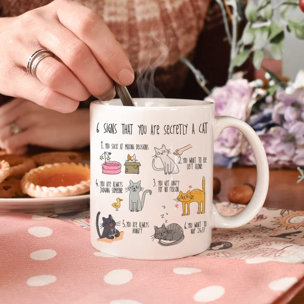 Frendorf | 6 Zeichen, dass Sie heimlich eine Katze sind Tasse