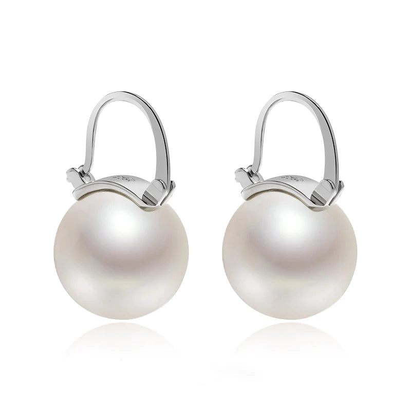 Frendorf | Black pearl earrings Available in white champagne gray gold and black pearl dangling earrings