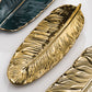 Nordic Light Luxury Stil auf goldener Federplatte Retro Schmuckplatte Aufbewahrung Platte Snack Platte Wohnkultur