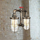 Frendorf | Farmhouse Drahtschutz Wandlampe mit Ventilrad 2 Glühbirnen Schmiedeeisen Wandleuchte in Messing