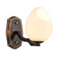 Frendorf | Traditionalist Ei-achtige Wandlamp Verlichting 1 Licht Witte Gezuurde Glazen Wandlamp in Zwart