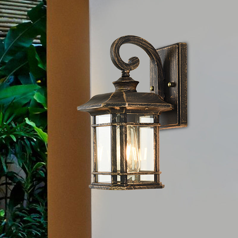 Frendorf | Bronze Curvy Arm Wandverlichting Platteland Helder Golfglas Enkelhoofd Buiten Wandlamp
