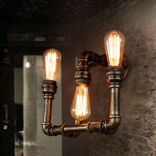 Frendorf | Industrielle Exposed Wandlampe mit Rohrdesign 3 Köpfe Schmiedeeisen Wandleuchte in antikem Messing für Flur