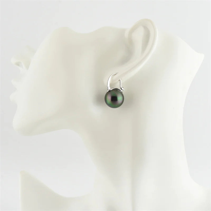 Frendorf | Black pearl earrings Available in white champagne gray gold and black pearl dangling earrings