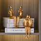 Abstrakte goldene Skulpturen & Figuren für das Interieur Harzfigur Statue moderne Wohnkultur Schreibtischaccessoires nordische Raumdekoration