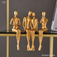 Abstrakte goldene Skulpturen & Figuren für das Interieur Harzfigur Statue moderne Wohnkultur Schreibtischaccessoires nordische Raumdekoration