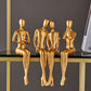 Abstrakte goldene Skulpturen & Figuren für das Interieur Harzfigur Statue moderne Wohnkultur Schreibtischaccessoires nordische Raumdekoration