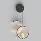 Zeitgenössische nordische Astronauten-Mond-Sterne-Muster-Acryl-Eisen-LED-Wandleuchte für das Wohnzimmer