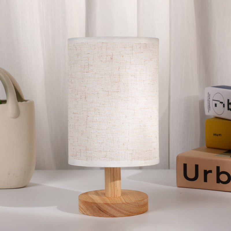 Moderne Art Deco zylindrische Holzbasis Stoffschirm LED Tischlampe für das Schlafzimmer