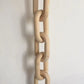 Moderne Holzkettenverzierung