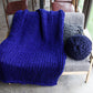 Schwere Strickdecke