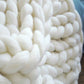 Schwere Strickdecke
