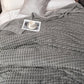 EliteWave Plaid - Ultrafluffy strukturierte korallfarbene Fleece-Decke