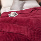 EliteWave Plaid - Ultrafluffy strukturierte korallfarbene Fleece-Decke