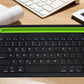 Frendorf | B908 Ultra-slim 78 Tasten Bluetooth Wireless Tastatur mit konkavem Handyhalter (Schwarz)