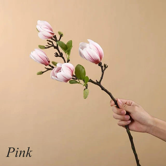 Lebensechte künstliche Magnolienzweige