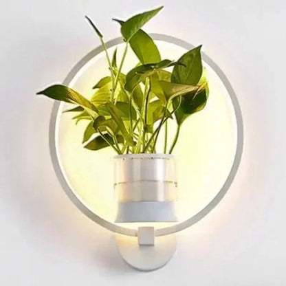 Moderne Wandlampe mit Pflanzenhalter – Stimmungslicht für eine grüne Note