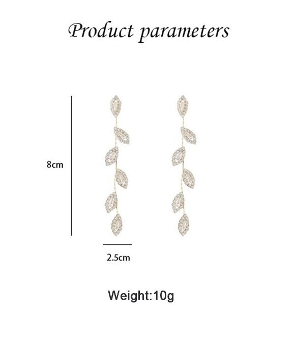Frendorf | Lange Ohrringe mit zarten goldenen Blättern